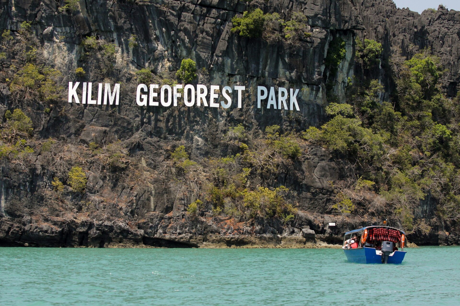 Beautiful scenery of a sailing boats in Kilim Geoforest Park.