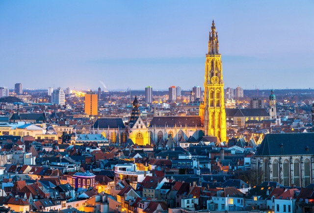 Antwerp cityscape with cathedral of Our Lady at dusk