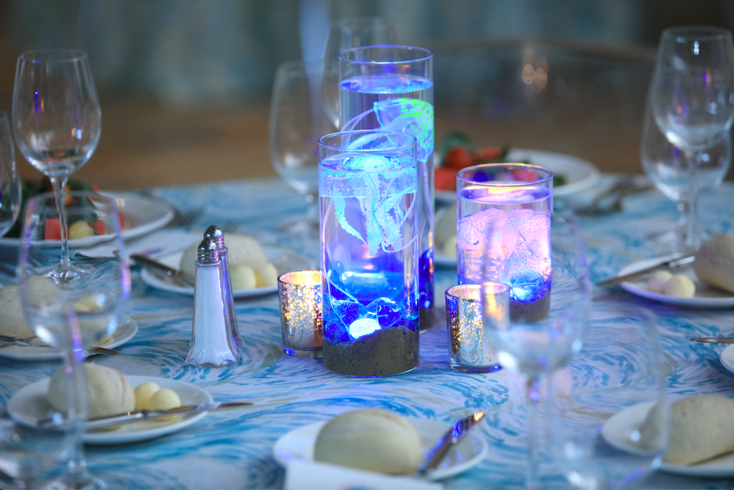 Table setting with blue jellyfish centerpiece