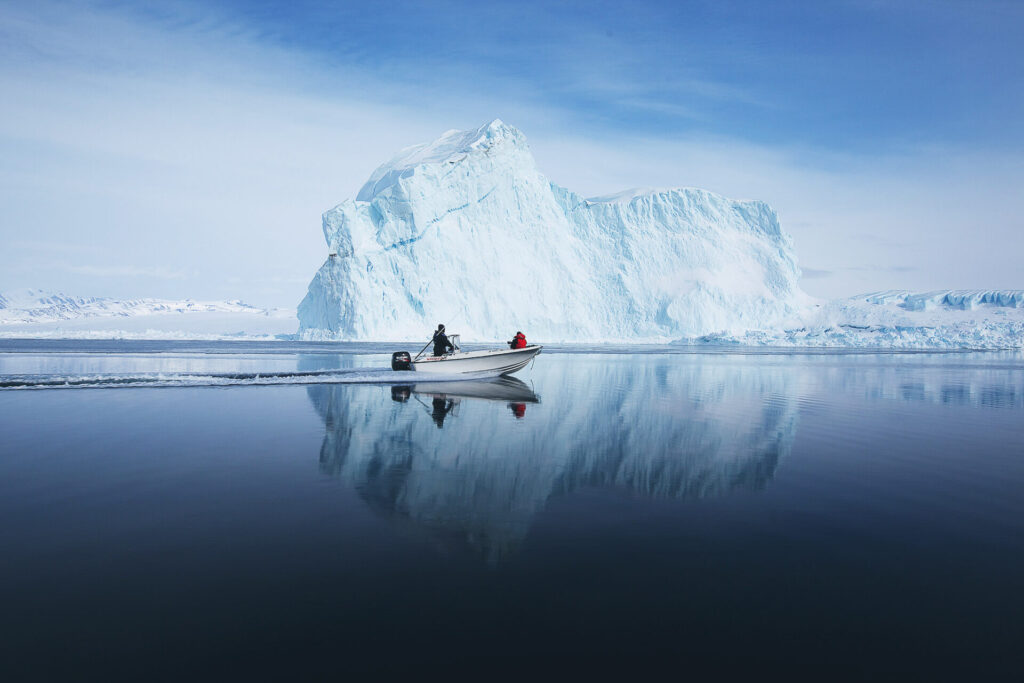 Boat riding by a glacier