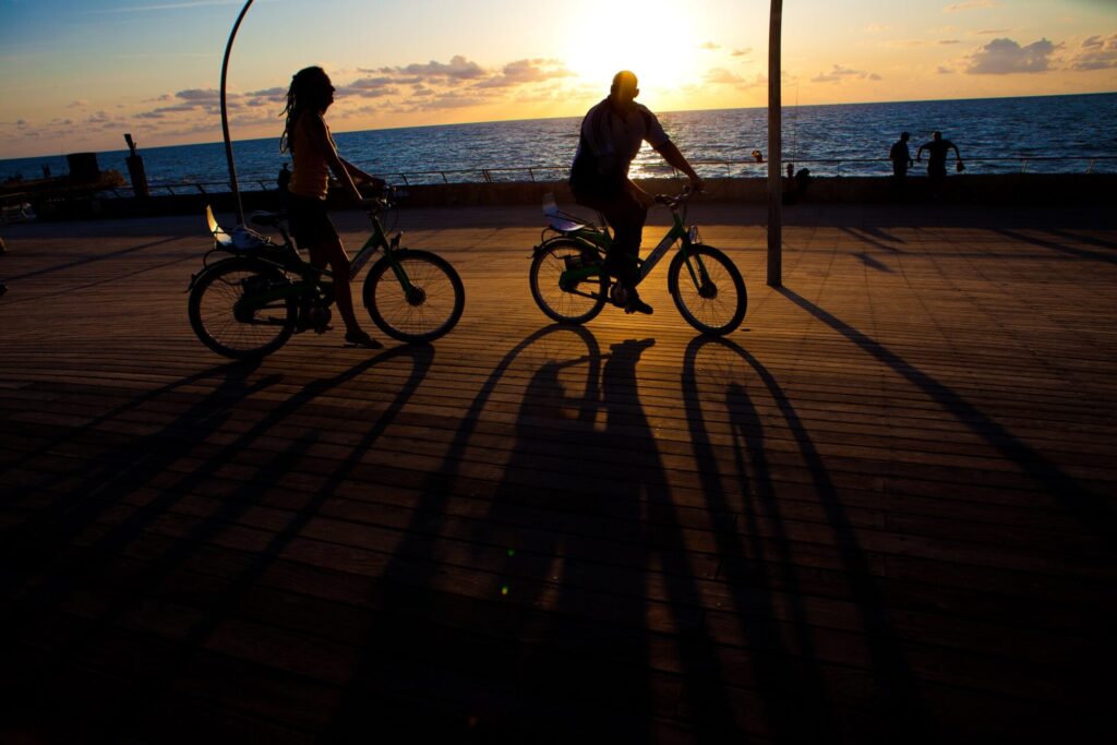 People riding a city bike